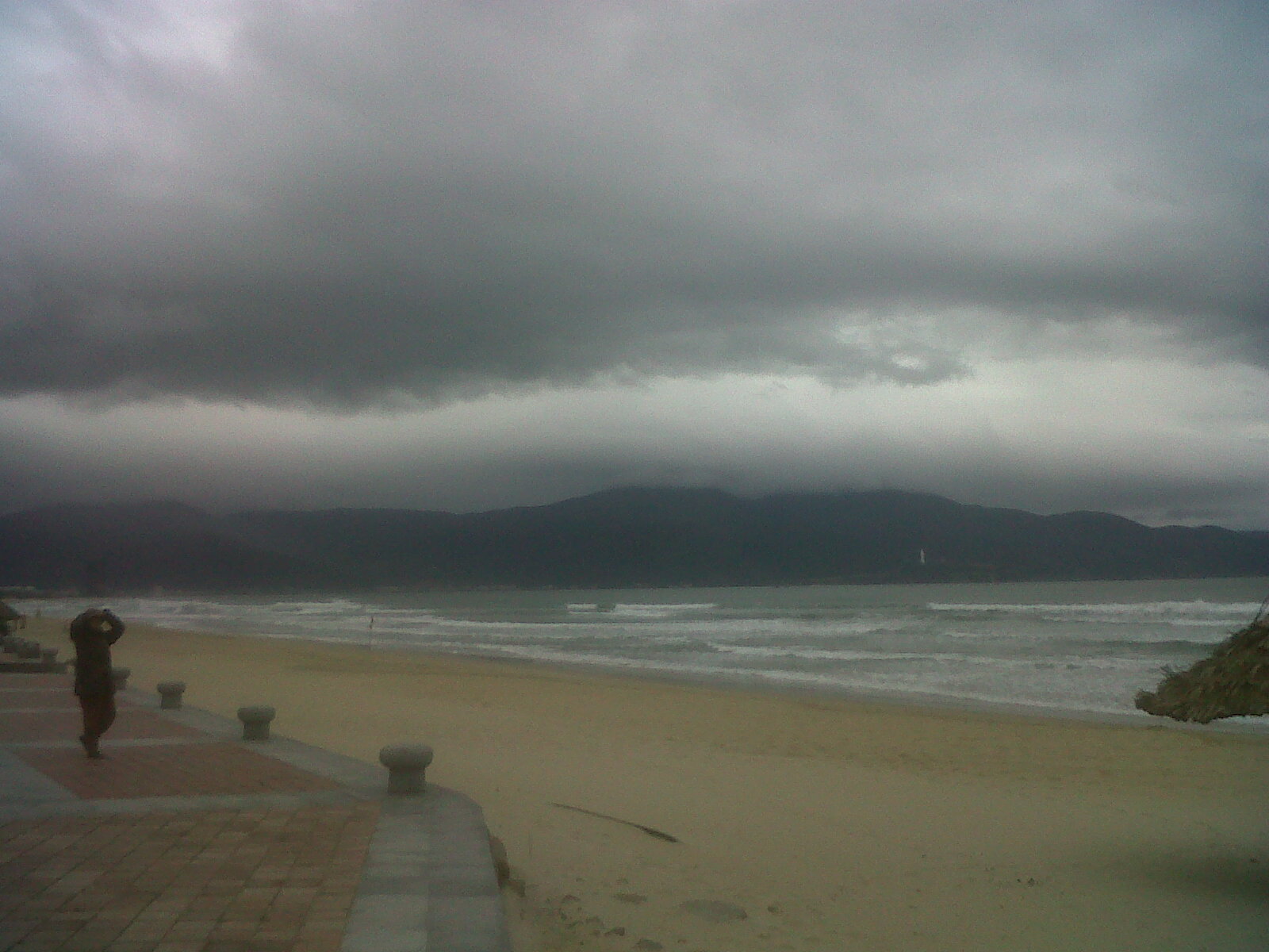 danang beach across doan 27 hotel and statue cross feb14