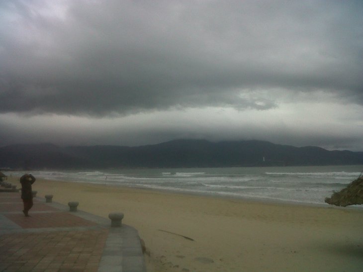 danang beach across doan 27 hotel and statue cross feb14