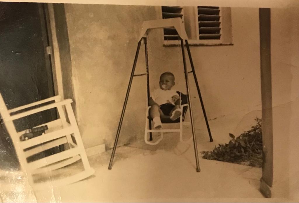 Punta Brava house pedro plays with swing about 18 mos old c1959