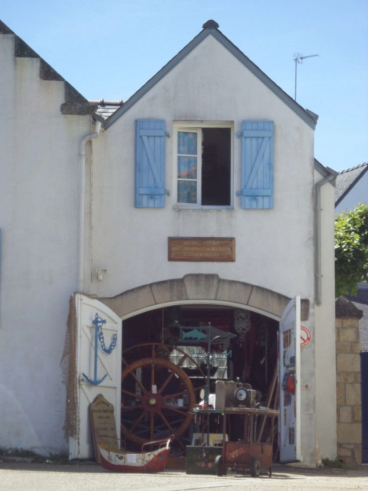 La trinite sur mer bike and boat shop repairs by mem to the fallen and church jun15